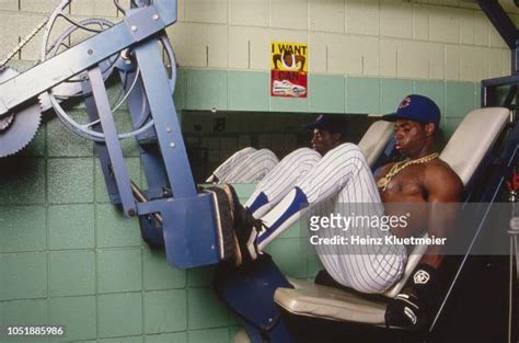 Columbus Clippers Deion Sanders topless in locker room lifting...